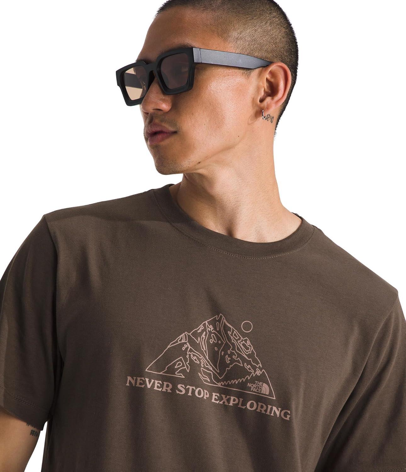 imageThe North Face Mens Evolution MTN Base ShortSleeve Tee Cotton Shirt with a Graphic Design Set in Sleeves Ribbed CollarSmokey Brown