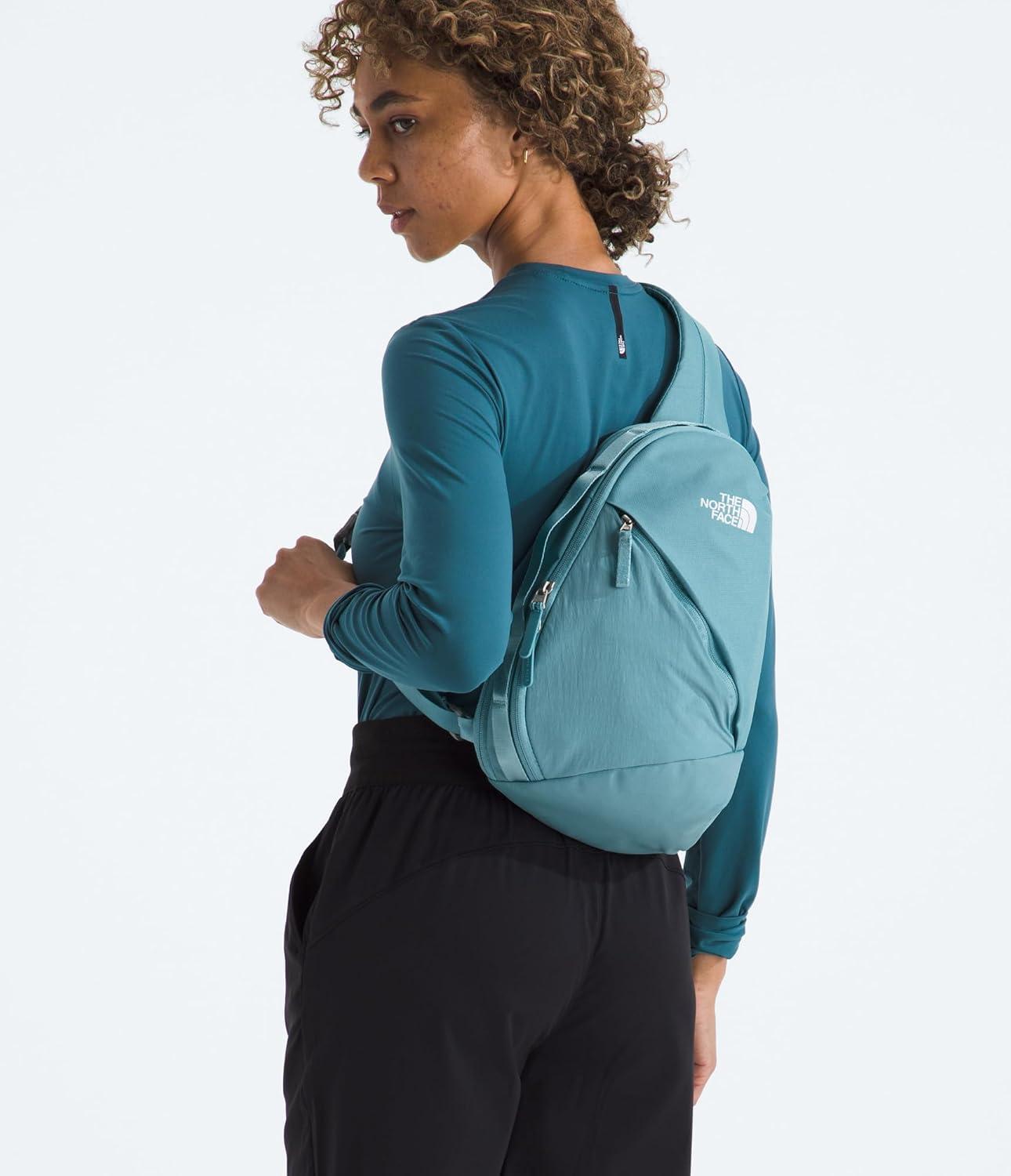 imageTHE NORTH FACE Womens Isabella SIing Slim Carry Crossbody Bag With Large Main Compartment Water RepellentBlue Eclipse Light HeatherTnf White
