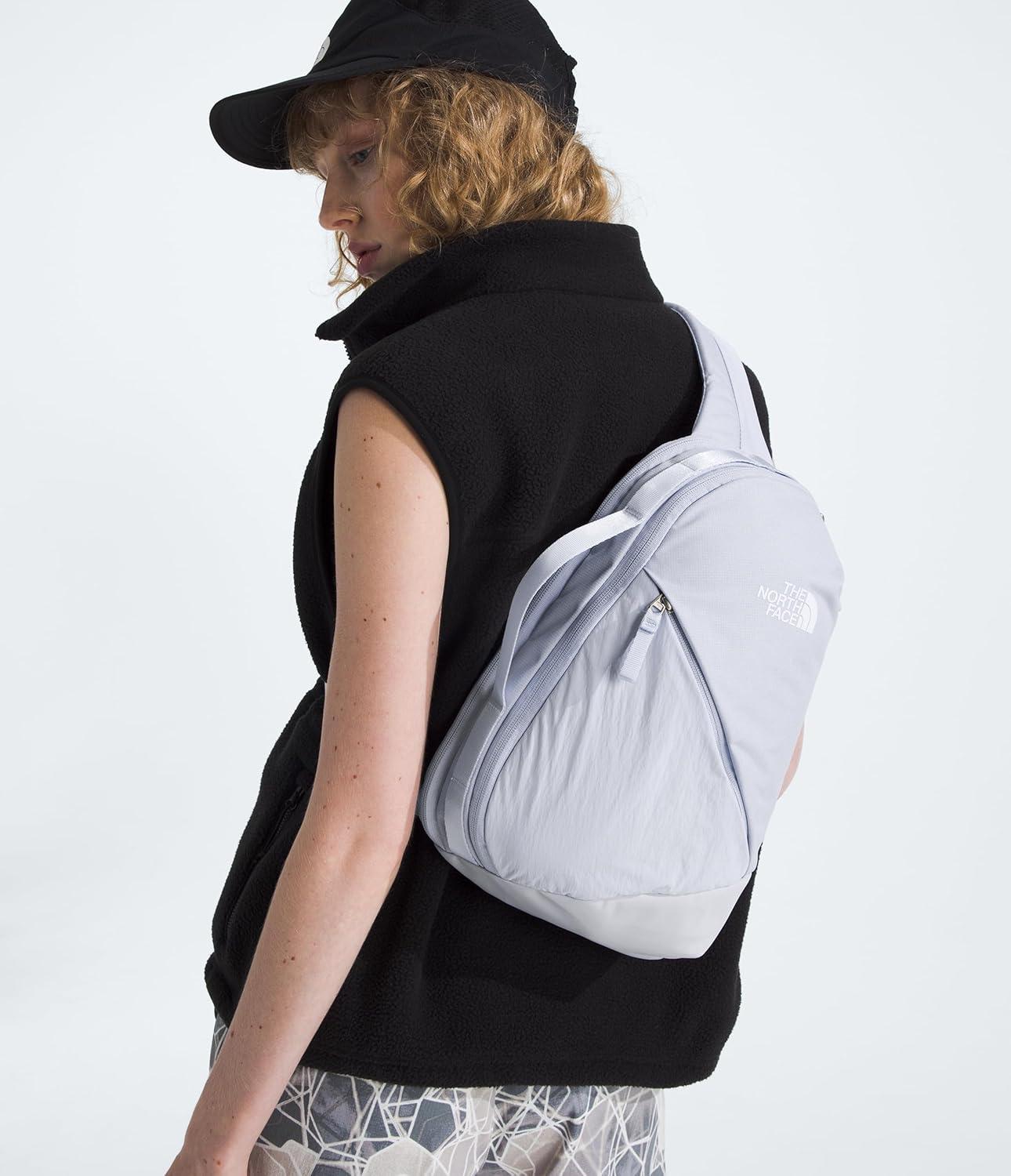 imageTHE NORTH FACE Womens Isabella SIing Slim Carry Crossbody Bag With Large Main Compartment Water RepellentMystic Haze Dark HeatherTnf White