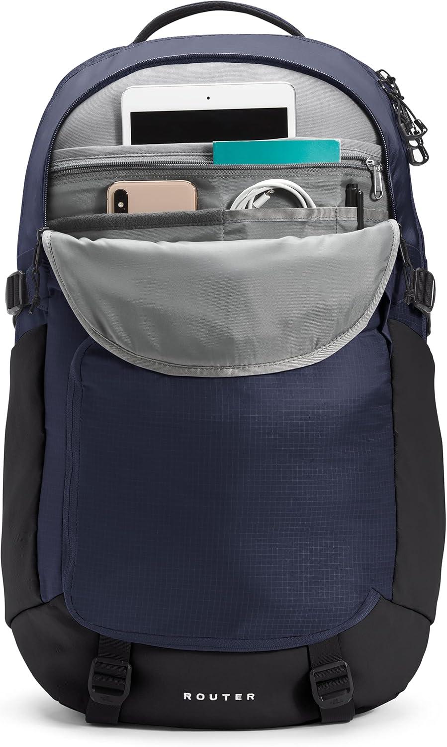 imageThe North Face Router Everyday Laptop Backpack Daypack with Water Repellent Finish 17quot Laptop Sleeve Reflective Details Asphalt Grey Light HeatherTNF BlackNPF One SizeTnf NavyTnf Black
