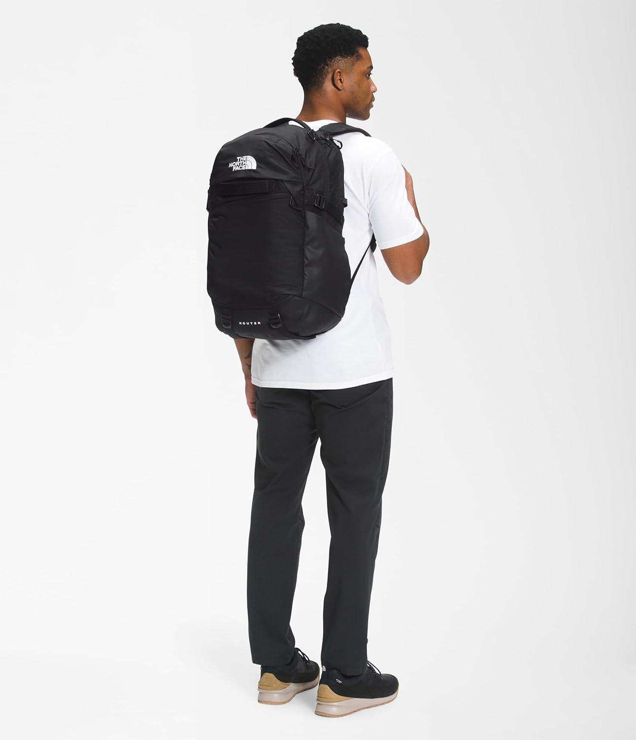 imageThe North Face Router Everyday Laptop Backpack Daypack with Water Repellent Finish 17quot Laptop Sleeve Reflective Details Asphalt Grey Light HeatherTNF BlackNPF One SizeTnf BlackTnf Black