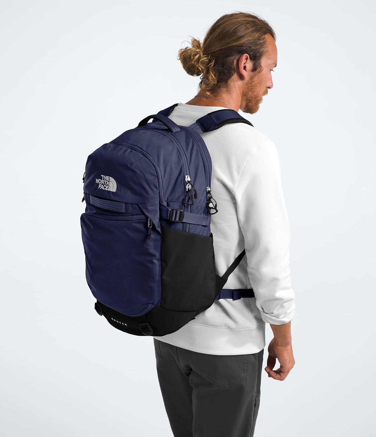 imageThe North Face Router Everyday Laptop Backpack Daypack with Water Repellent Finish 17quot Laptop Sleeve Reflective Details Asphalt Grey Light HeatherTNF BlackNPF One SizeTnf NavyTnf Blacknpf