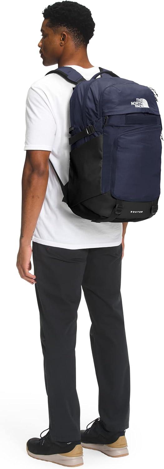 imageThe North Face Router Everyday Laptop Backpack Daypack with Water Repellent Finish 17quot Laptop Sleeve Reflective Details Asphalt Grey Light HeatherTNF BlackNPF One SizeTnf NavyTnf Black