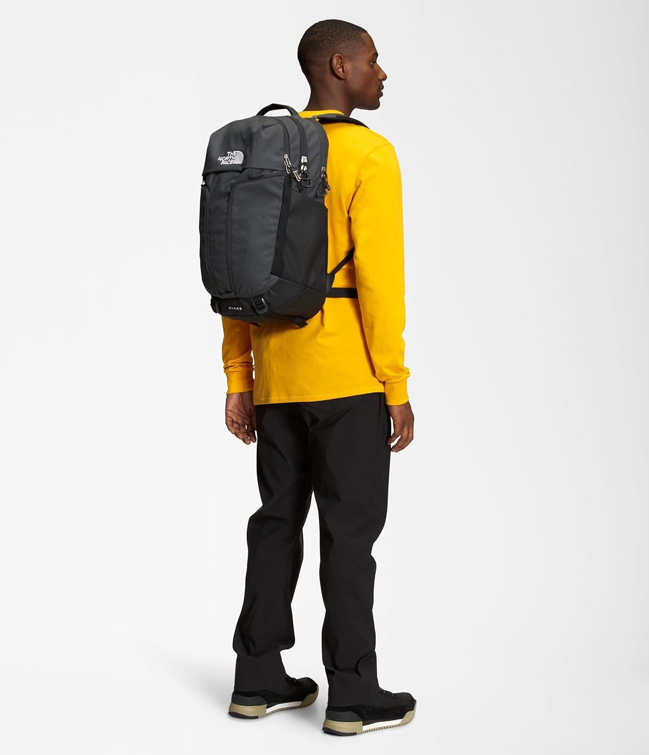 imageThe North Face Surge Commuter Laptop Backpack Daypack with Water Repellent Finish 16quot Laptop Sleeve Reflective Details Meld Grey Dark HeatherTNF BlackNPF One SizeAsphalt Grey Light HeatherTnf Blacknpf