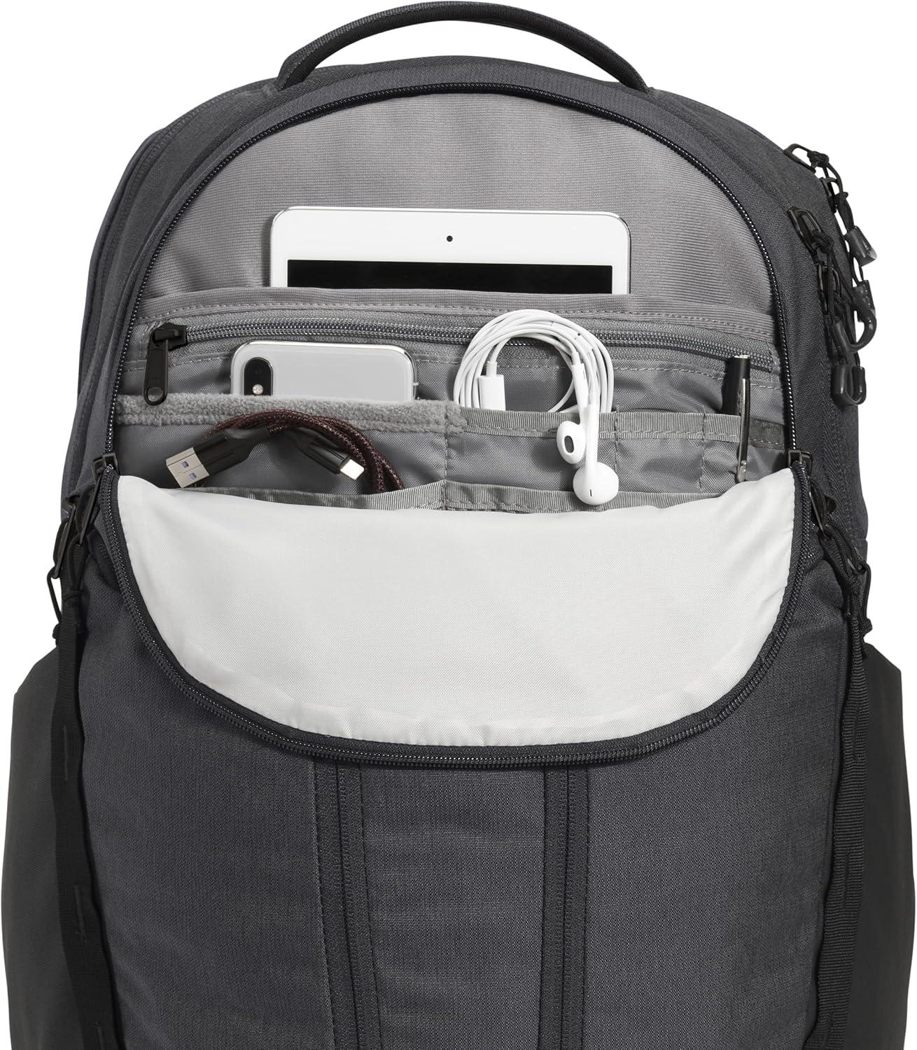 imageThe North Face Surge Commuter Laptop Backpack Daypack with Water Repellent Finish 16quot Laptop Sleeve Reflective Details Meld Grey Dark HeatherTNF BlackNPF One SizeAsphalt Grey Light HeatherTnf Blacknpf