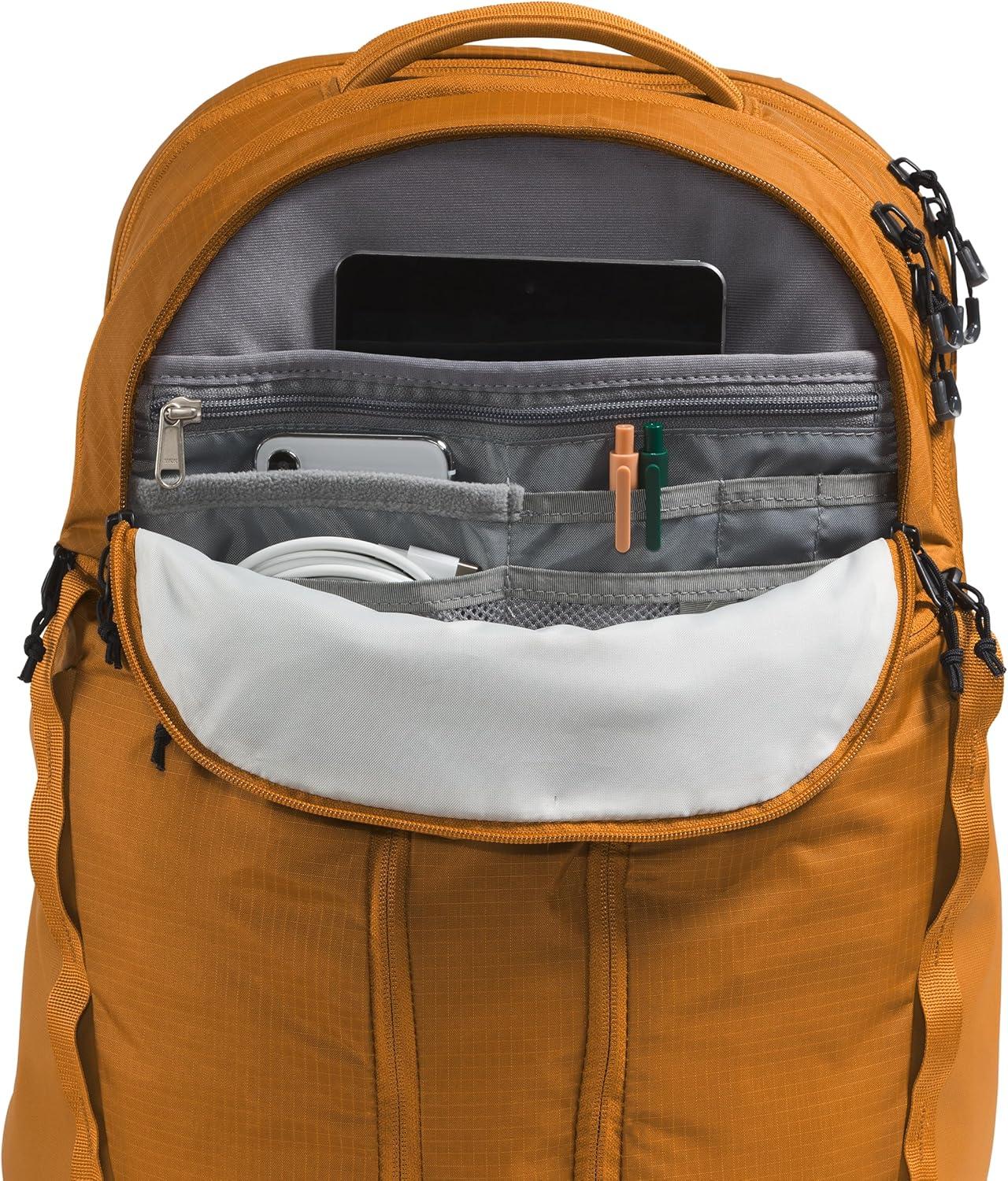 imageThe North Face Surge Commuter Laptop Backpack Daypack with Water Repellent Finish 16quot Laptop Sleeve Reflective Details Meld Grey Dark HeatherTNF BlackNPF One SizeTimber Tan