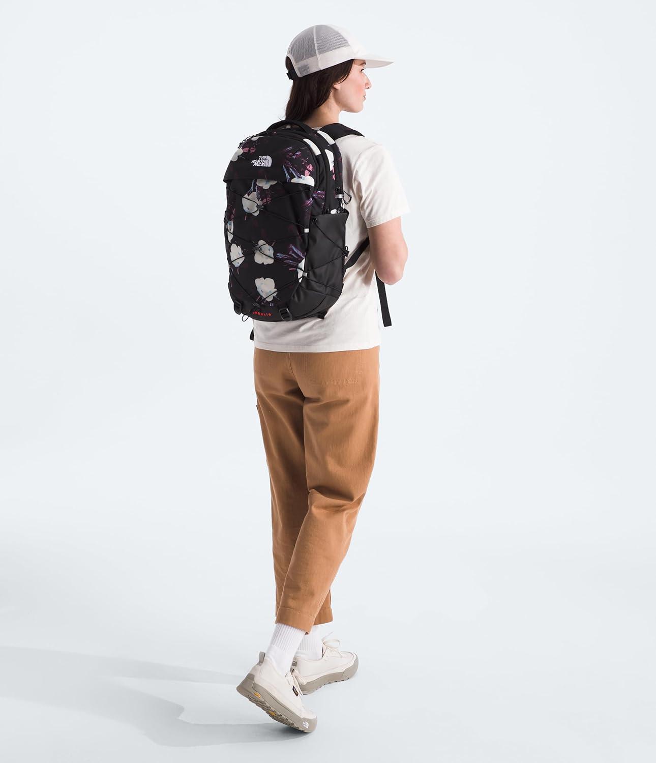 imageThe North Face Womens Borealis Commuter Laptop Backpack Everyday Travel Bag with 16quot Laptop Sleeve WomenSpecific Fit Reflective Details TNF BlackTNF WhiteNPF One SizeTnf Black Winter Flowers Print