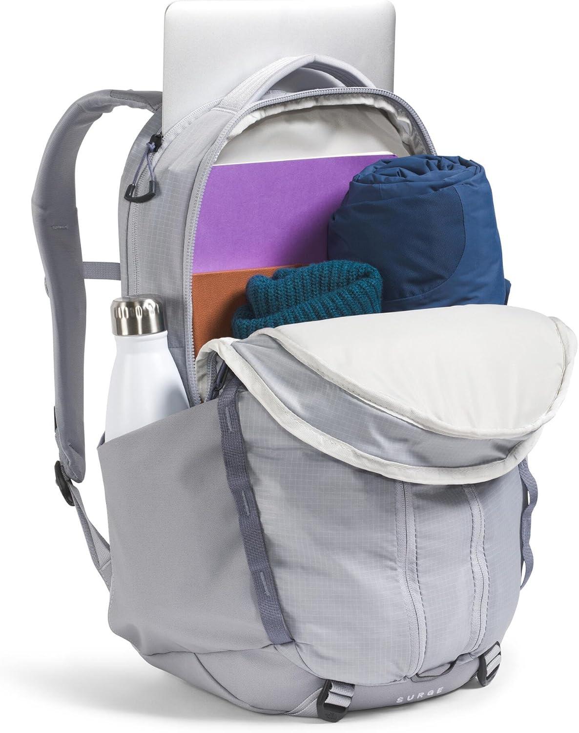imageThe North Face Womens Surge Commuter Laptop Backpack Everyday Travel Bag with 16quot Laptop Sleeve WaterRepellent Finish WomenSpecific Fit TNF BlackTNF BlackNPF One SizeBlue FlaxTwilight Galaxy