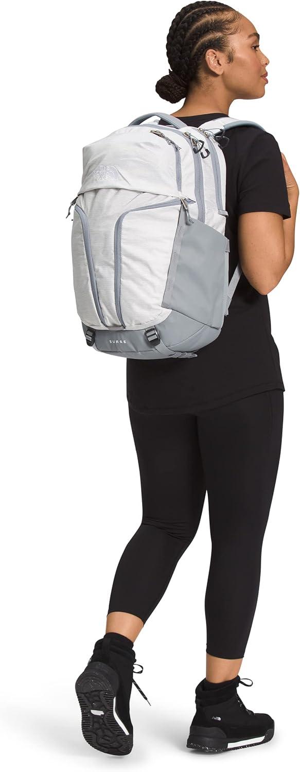 imageThe North Face Womens Surge Commuter Laptop Backpack Everyday Travel Bag with 16quot Laptop Sleeve WaterRepellent Finish WomenSpecific Fit TNF BlackTNF BlackNPF One SizeTnf White Metallic MlangeMid Grey