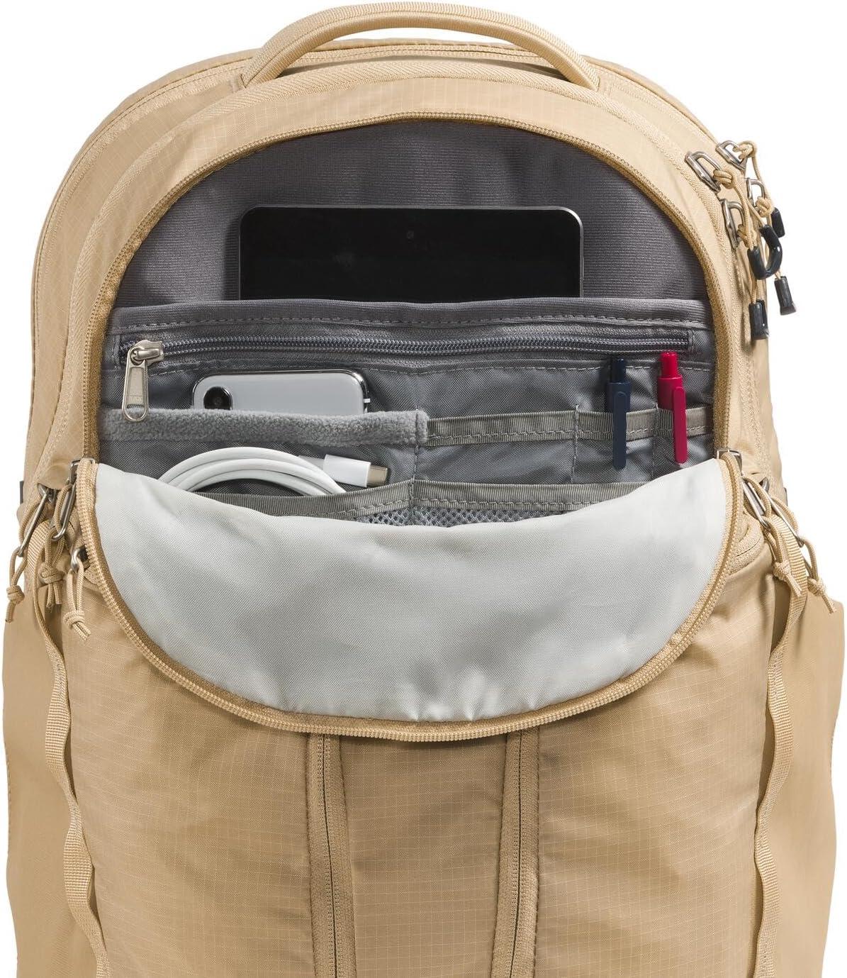 imageThe North Face Womens Surge Commuter Laptop Backpack Everyday Travel Bag with 16quot Laptop Sleeve WaterRepellent Finish WomenSpecific Fit TNF BlackTNF BlackNPF One SizeKhaki Stone