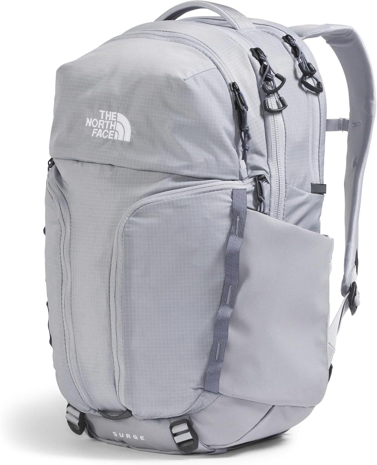 imageThe North Face Womens Surge Commuter Laptop Backpack Everyday Travel Bag with 16quot Laptop Sleeve WaterRepellent Finish WomenSpecific Fit TNF BlackTNF BlackNPF One SizeBlue FlaxTwilight Galaxy