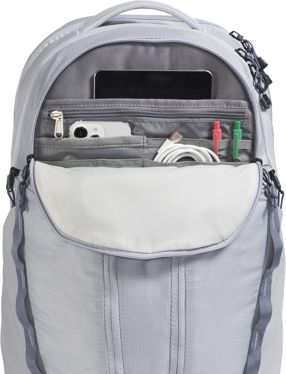 imageThe North Face Womens Surge Commuter Laptop Backpack Everyday Travel Bag with 16quot Laptop Sleeve WaterRepellent Finish WomenSpecific Fit TNF BlackTNF BlackNPF One SizeBlue FlaxTwilight Galaxy