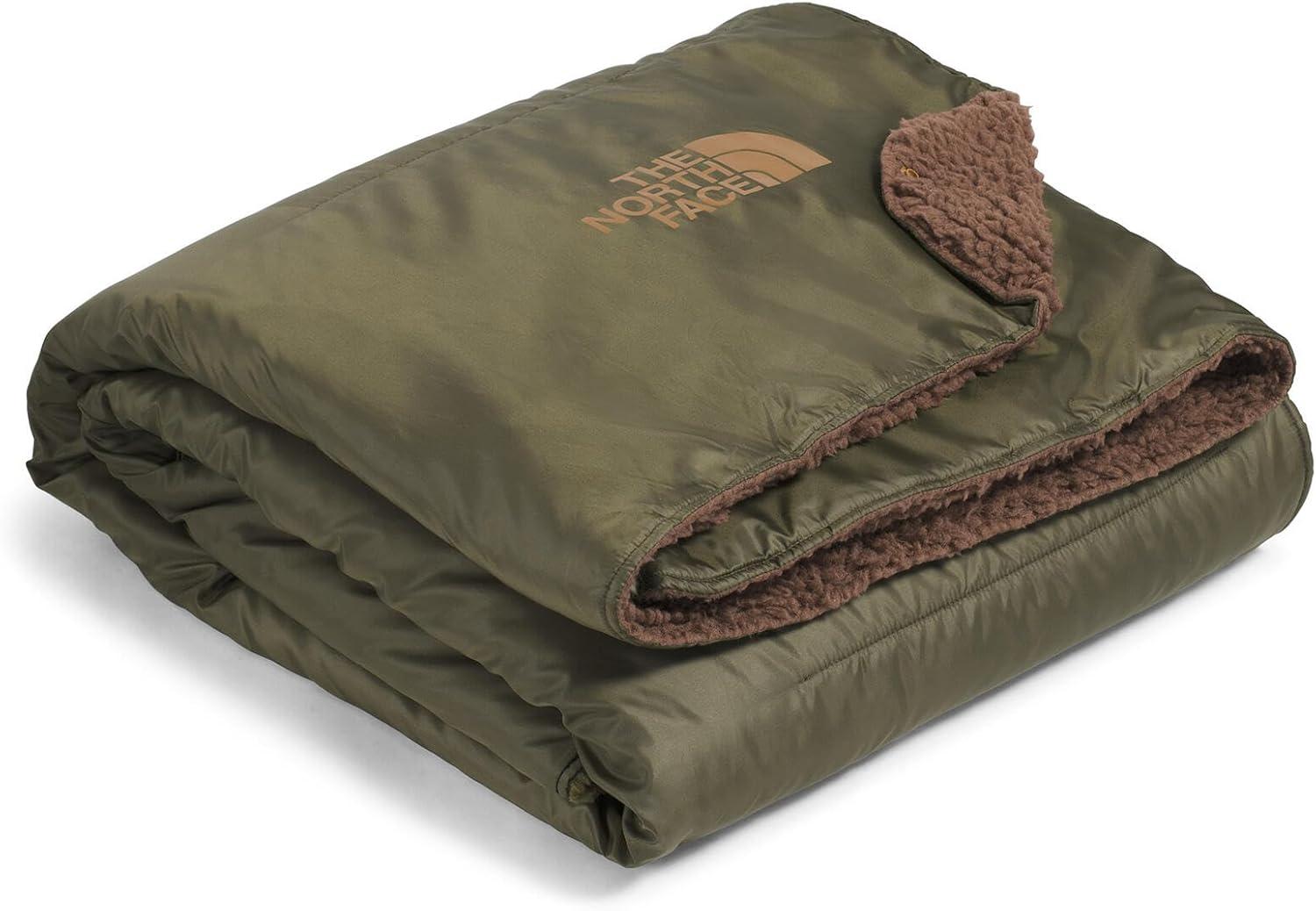 imageThe North Face Wawona Fuzzy Blanket Dual Sided ampamp Packable Design Ultra Soft Fleece Lining ampamp Water Repellent Outer Kangaroo Style Pocket New Taupe GreenSmokey Brown One SizeNew Taupe GreenSmokey Brown