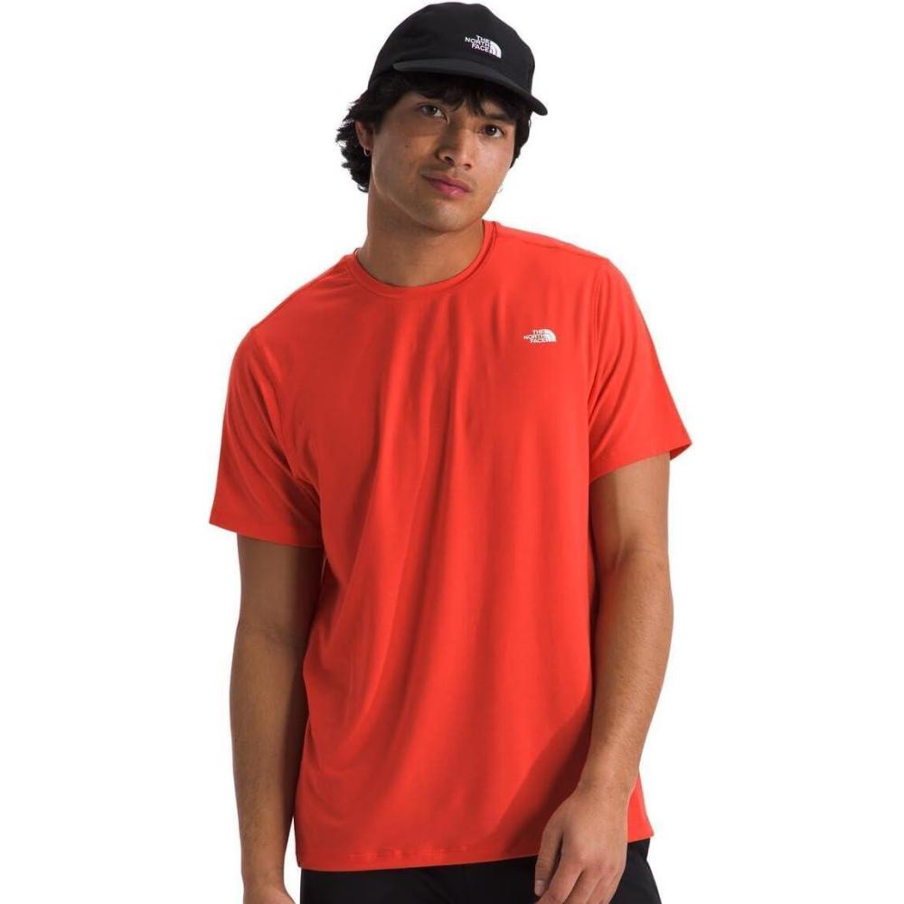 imageTHE NORTH FACE Mens Adventure Tee  Lightweight amp Stretchy Shirt With Setin Sleeves amp Heat Transfer LogoCrimson Orange