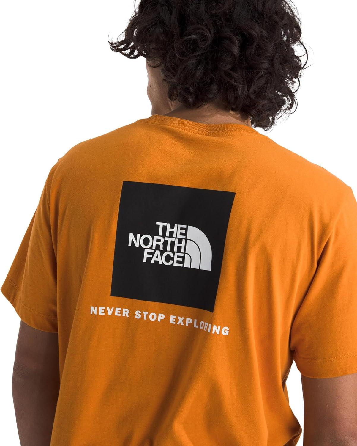imageTHE NORTH FACE Mens Core Box NSE Short Sleeve Tee Branded Tshirt With a Ribbed CollarDust Orange