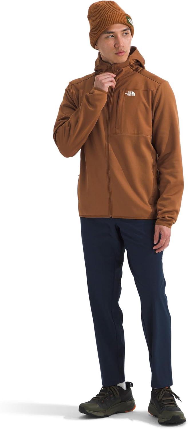 imageTHE NORTH FACE Mens TNF Performance Fleece Full Zip Hoodie Lightweight Hooded Top Elastic Binding amp Zip PocketsBurnt Umber