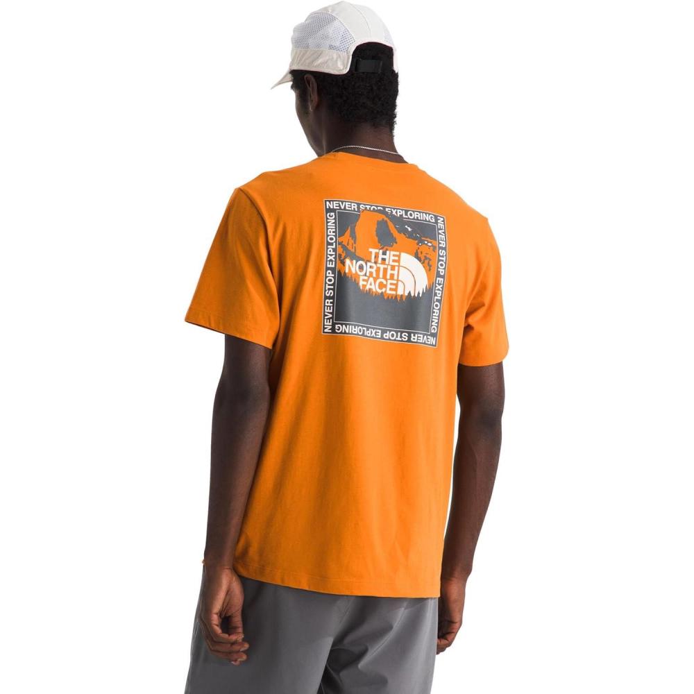 imageThe North Face Mens Stay Exploring ShortSleeve Tee Casual Graphic TShirt Regular Fit Soft Cotton FabricDust Orange