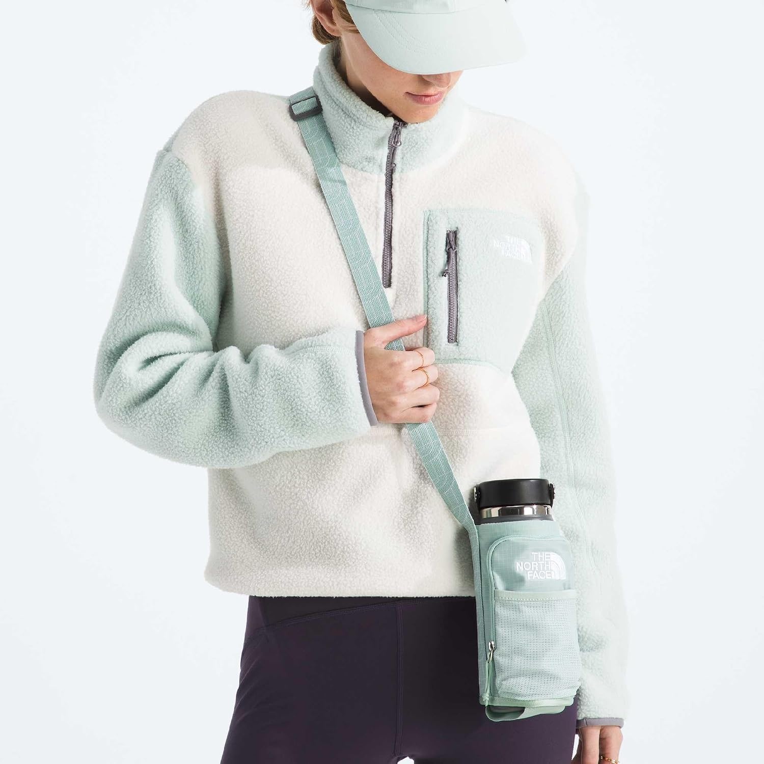 image:imageThe North Face Borealis Water Bottle Holder Adjustable Strap WaterRepellent Finish External Pocket with Key Hook Pale Plum Light HeatherPale Plum One SizeOpal Frost