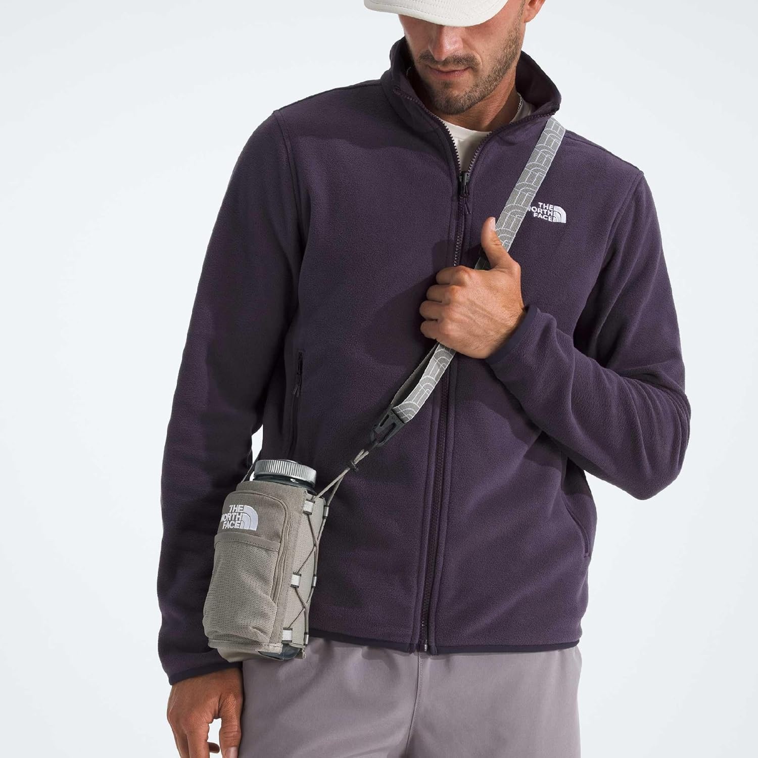 image:imageThe North Face Borealis Water Bottle Holder Adjustable Strap WaterRepellent Finish External Pocket with Key Hook Pale Plum Light HeatherPale Plum One SizeStone Slab Light HeatherStone Slab